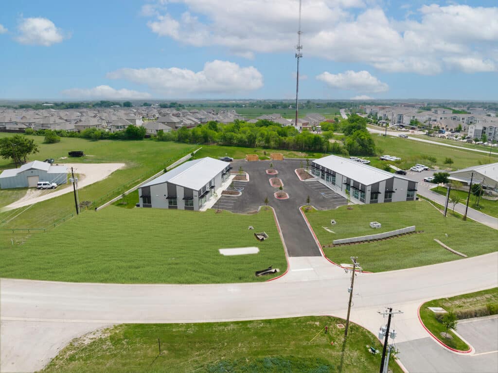 Aerial view of Kyle Business Park and surrounding open land, a commercial project by Aday & Associates
